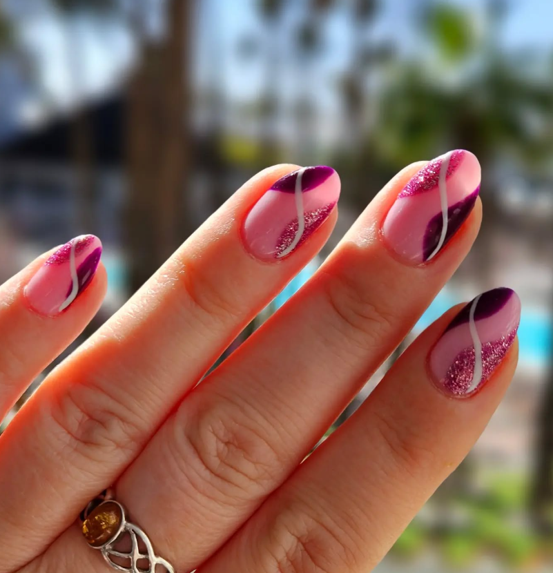 Pink and red abstract nail art manicure at Kat's Beauty